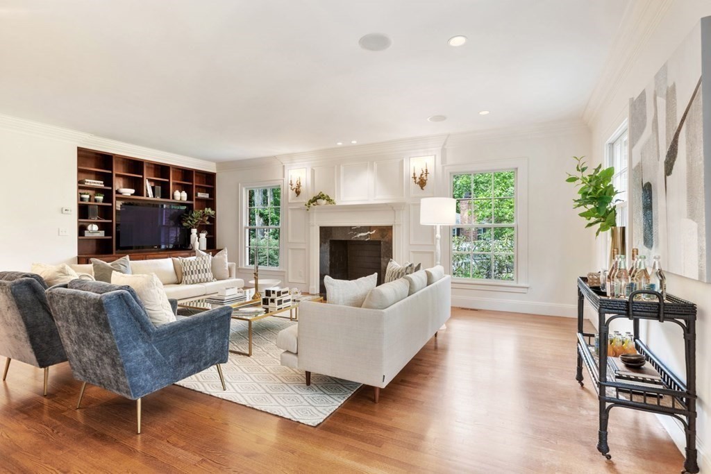 36 Audubon Road Wellesley, MA 02481 - Photo 27 of 40 a living room with furniture fireplace and a large window