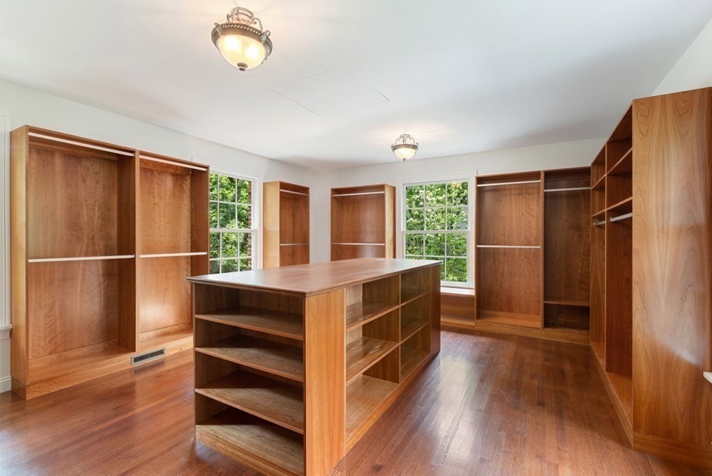 36 Audubon Road Wellesley, MA 02481 - Photo 34 of 40 a kitchen with wooden floors a sink and a refrigerator