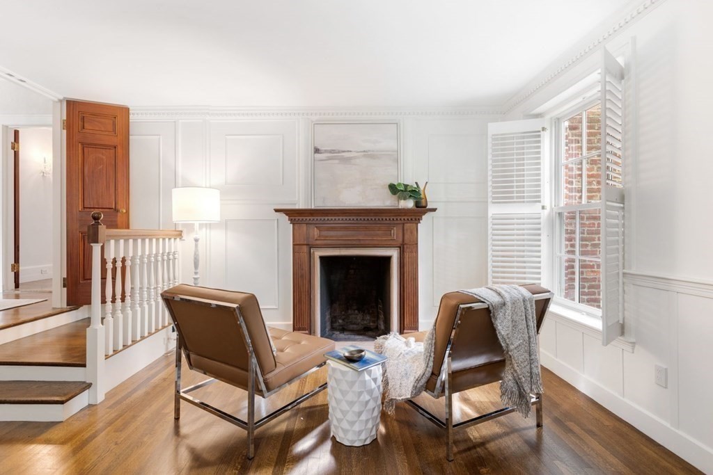 36 Audubon Road Wellesley, MA 02481 - Photo 7 of 40 a living room with furniture and a fireplace