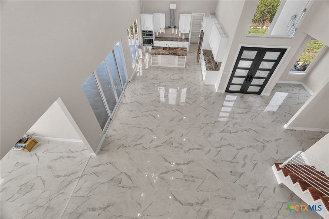 142 Wizard Way Spring Branch, TX 78070 - Photo 15 of 48 a view of kitchen and wooden floor