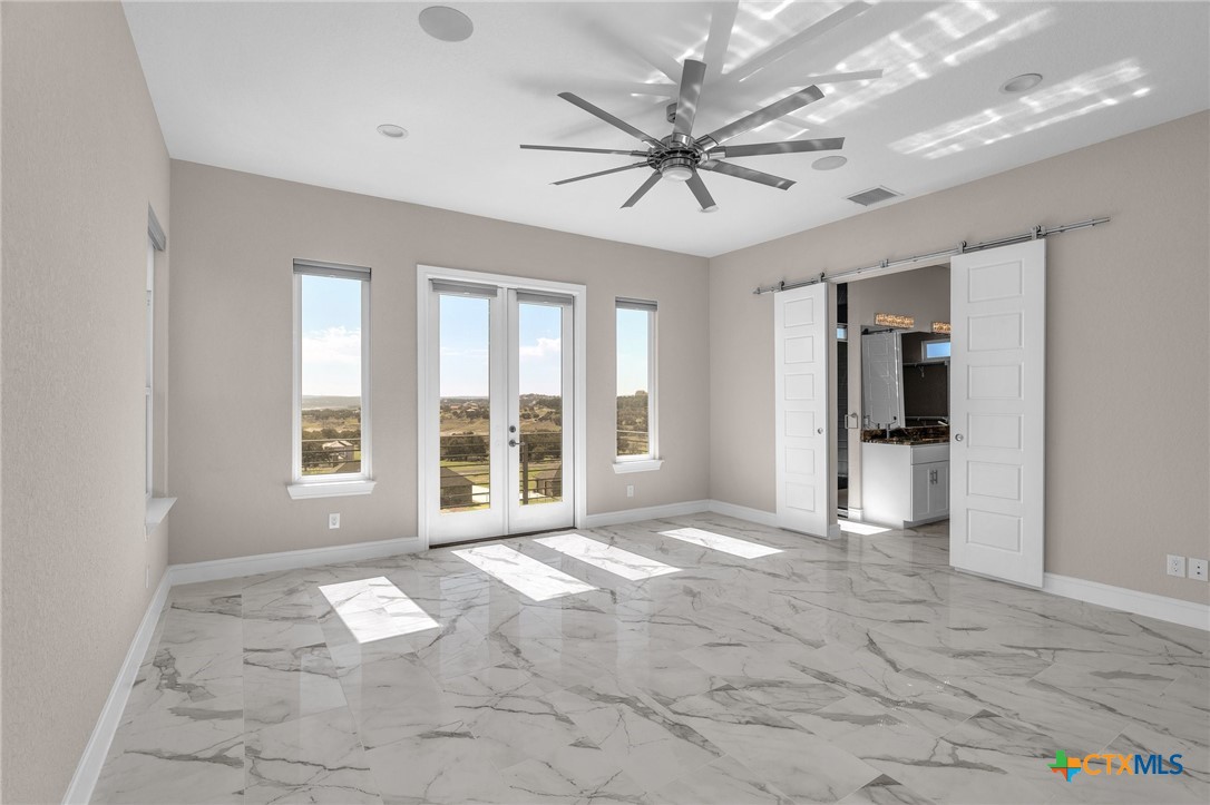 142 Wizard Way Spring Branch, TX 78070 - Photo 17 of 48 a view of an empty room with a window