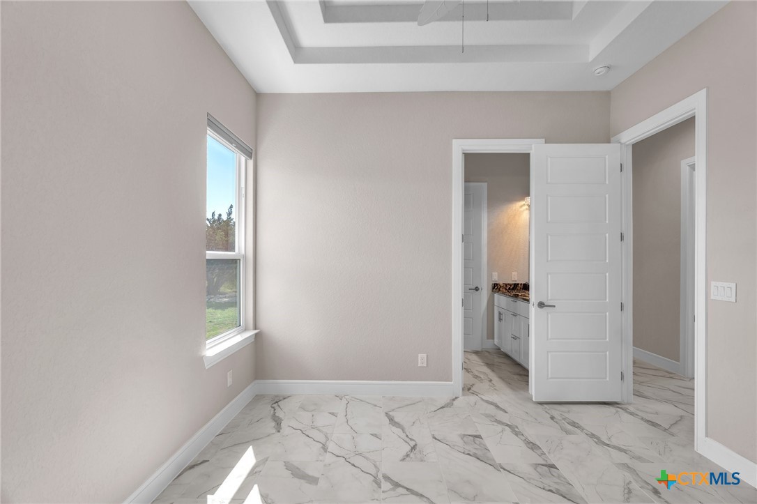 142 Wizard Way Spring Branch, TX 78070 - Photo 28 of 48 an empty room with windows