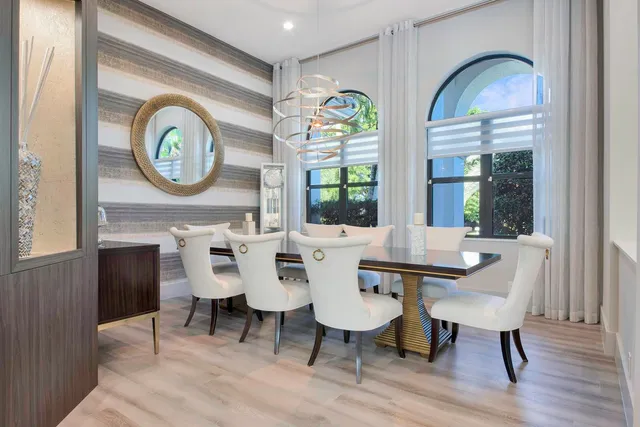 a kitchen with a sink a counter space and stainless steel appliances