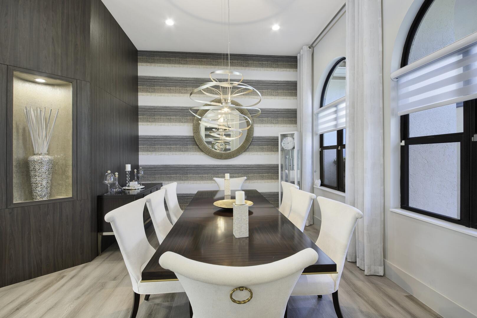 15271 Tall Oak Avenue Delray Beach, FL 33446 - Photo 27 of 60 a view of a dining room with furniture and chandelier