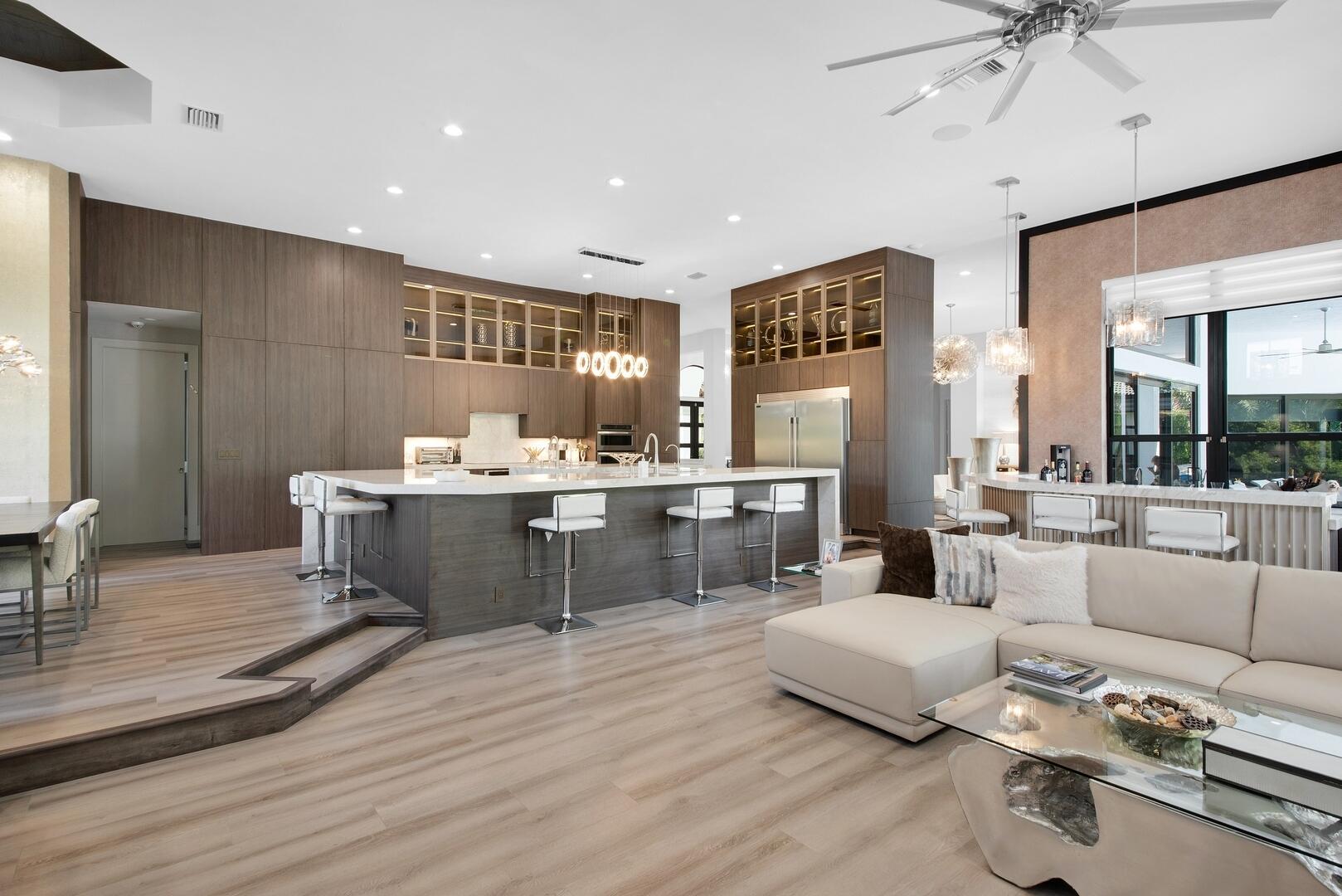 15271 Tall Oak Avenue Delray Beach, FL 33446 - Photo 32 of 60 a living room with furniture and view of kitchen