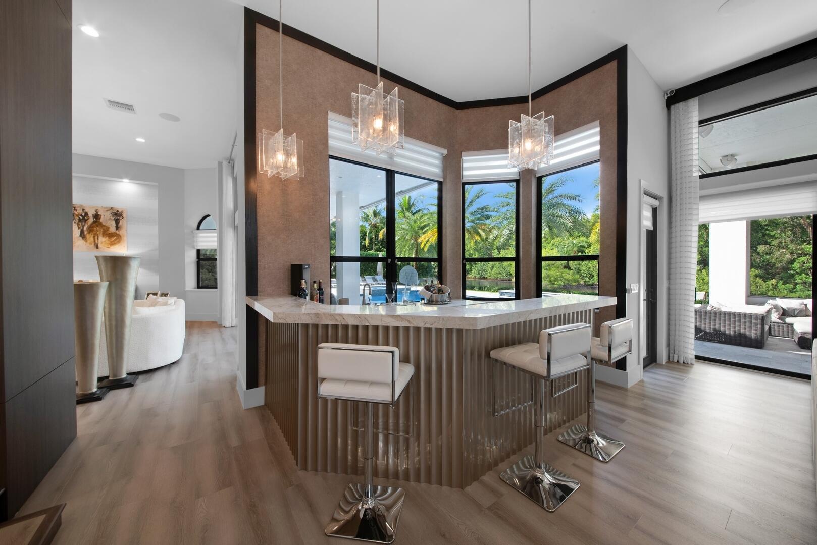 15271 Tall Oak Avenue Delray Beach, FL 33446 - Photo 36 of 60 a living room with furniture a large window with wooden floor