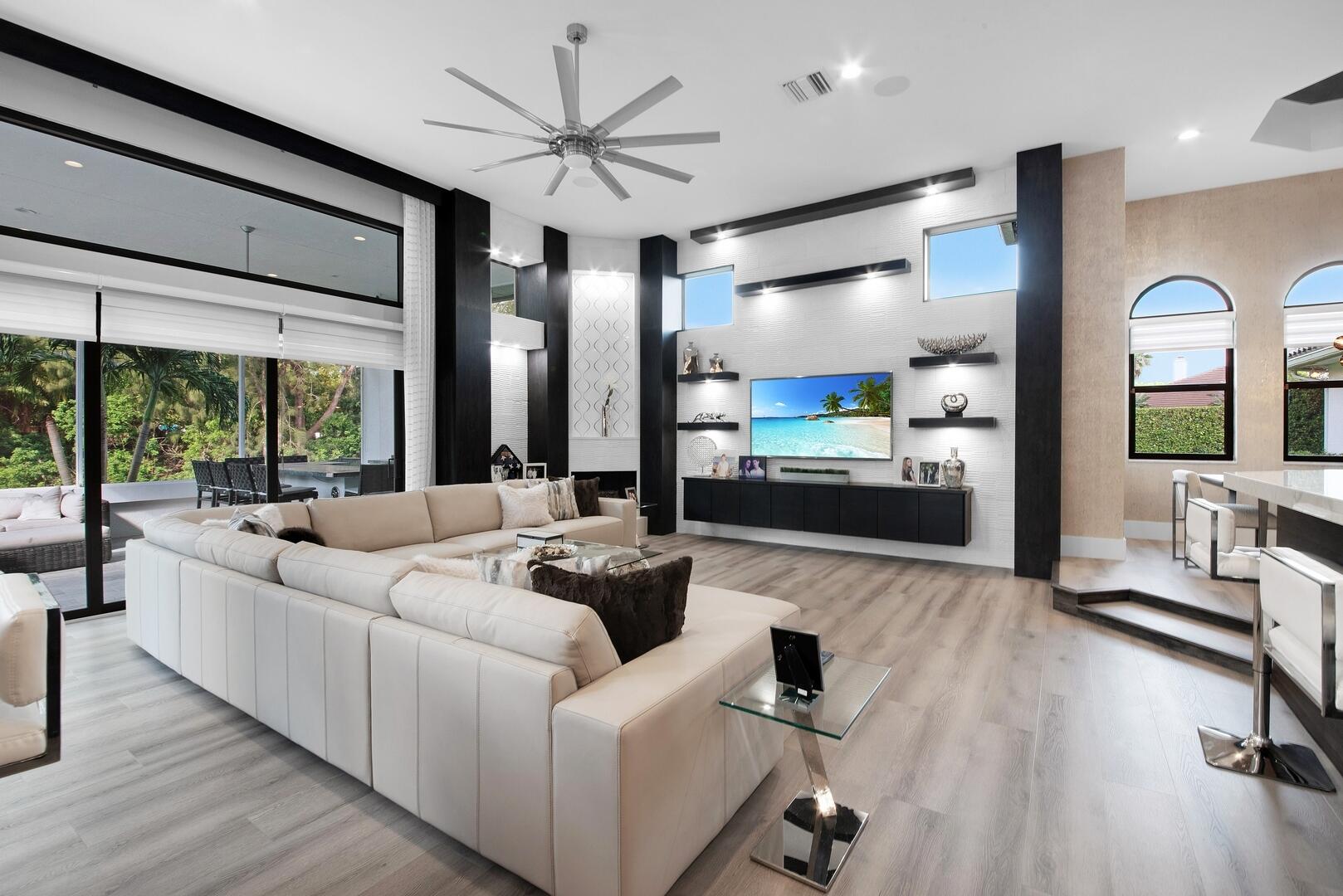 15271 Tall Oak Avenue Delray Beach, FL 33446 - Photo 37 of 60 a living room with furniture and a large window