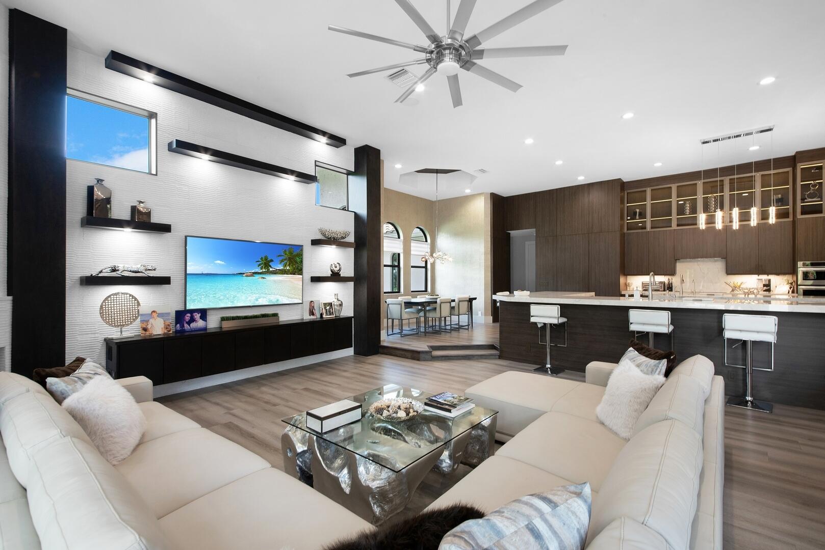 15271 Tall Oak Avenue Delray Beach, FL 33446 - Photo 38 of 60 a living room with furniture and a table