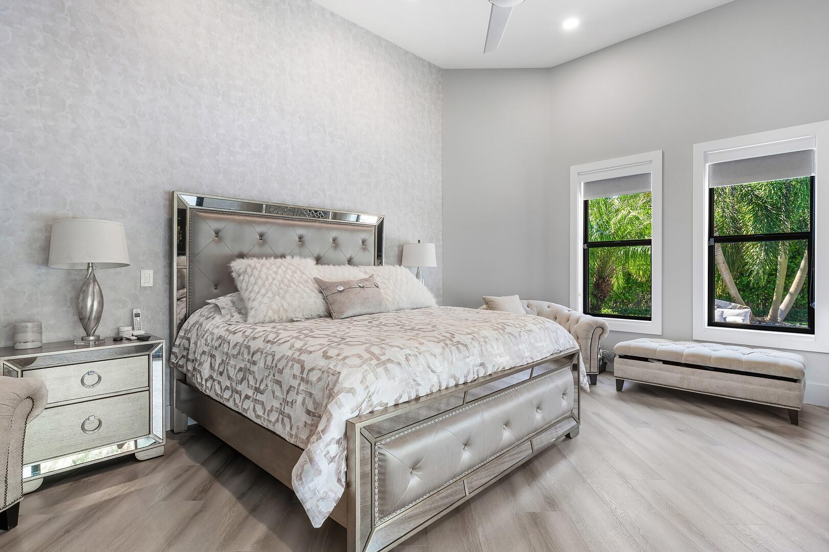 15271 Tall Oak Avenue Delray Beach, FL 33446 - Photo 42 of 60 a spacious bedroom with a bed and a window