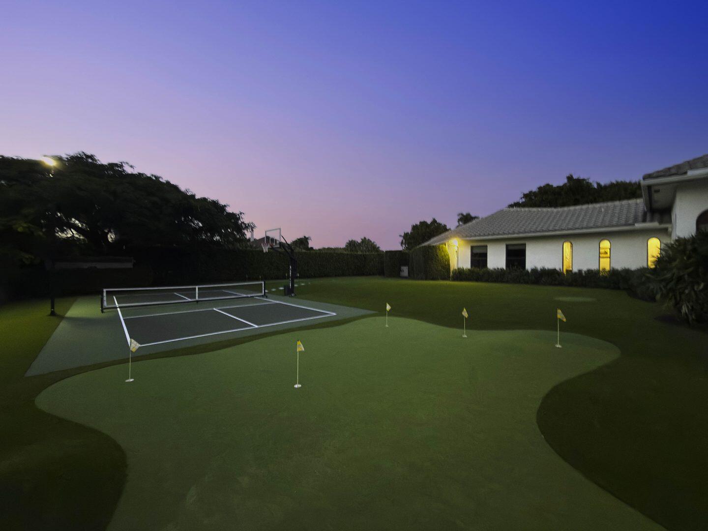 15271 Tall Oak Avenue Delray Beach, FL 33446 - Photo 8 of 60 a view of a tennis court