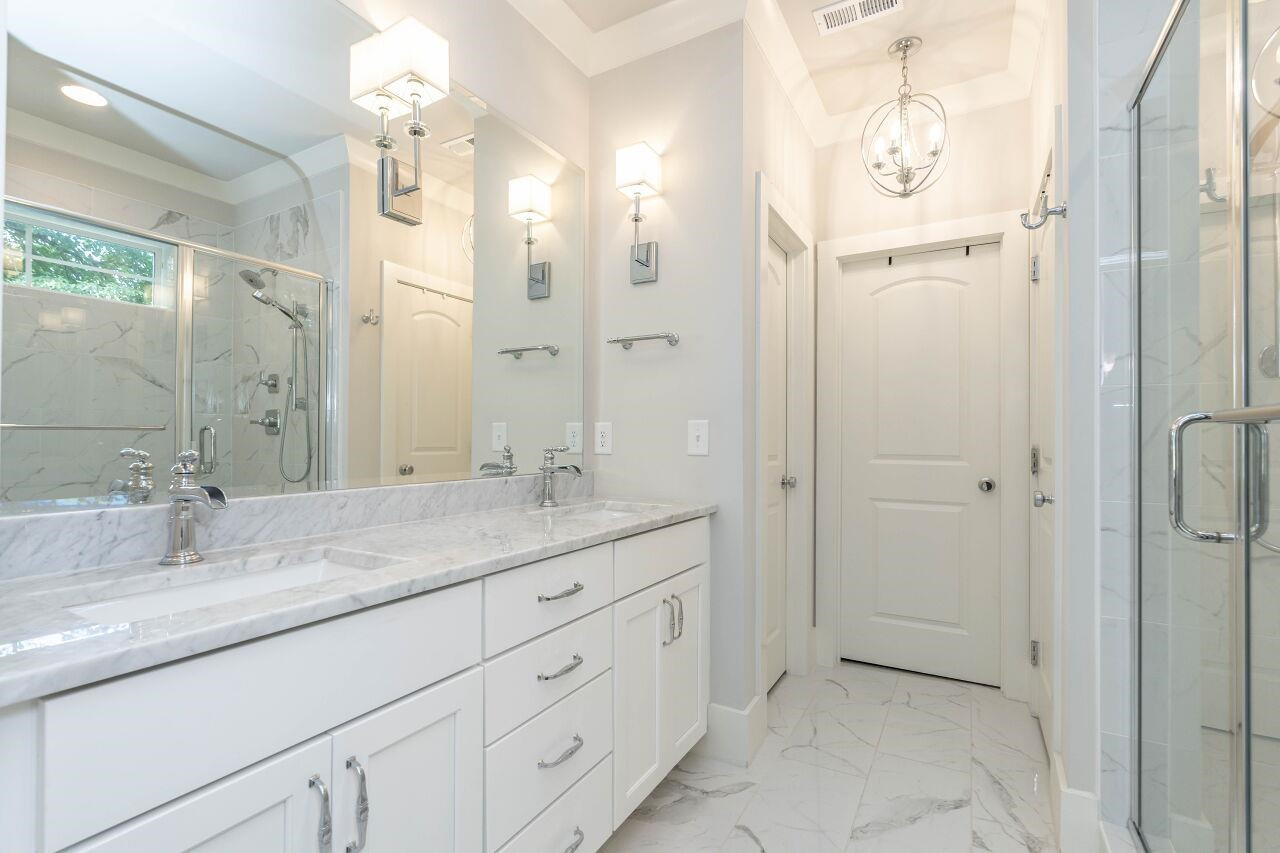 731 New Road Raleigh, NC 27608 - Photo 19 of 28 a bathroom with a granite countertop sink mirror and double