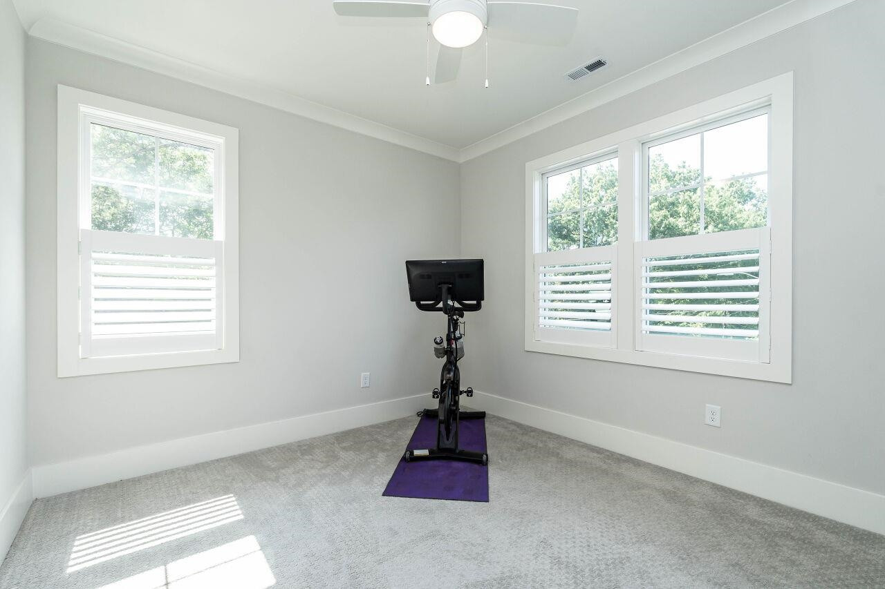 731 New Road Raleigh, NC 27608 - Photo 24 of 28 a room with window and a lamp