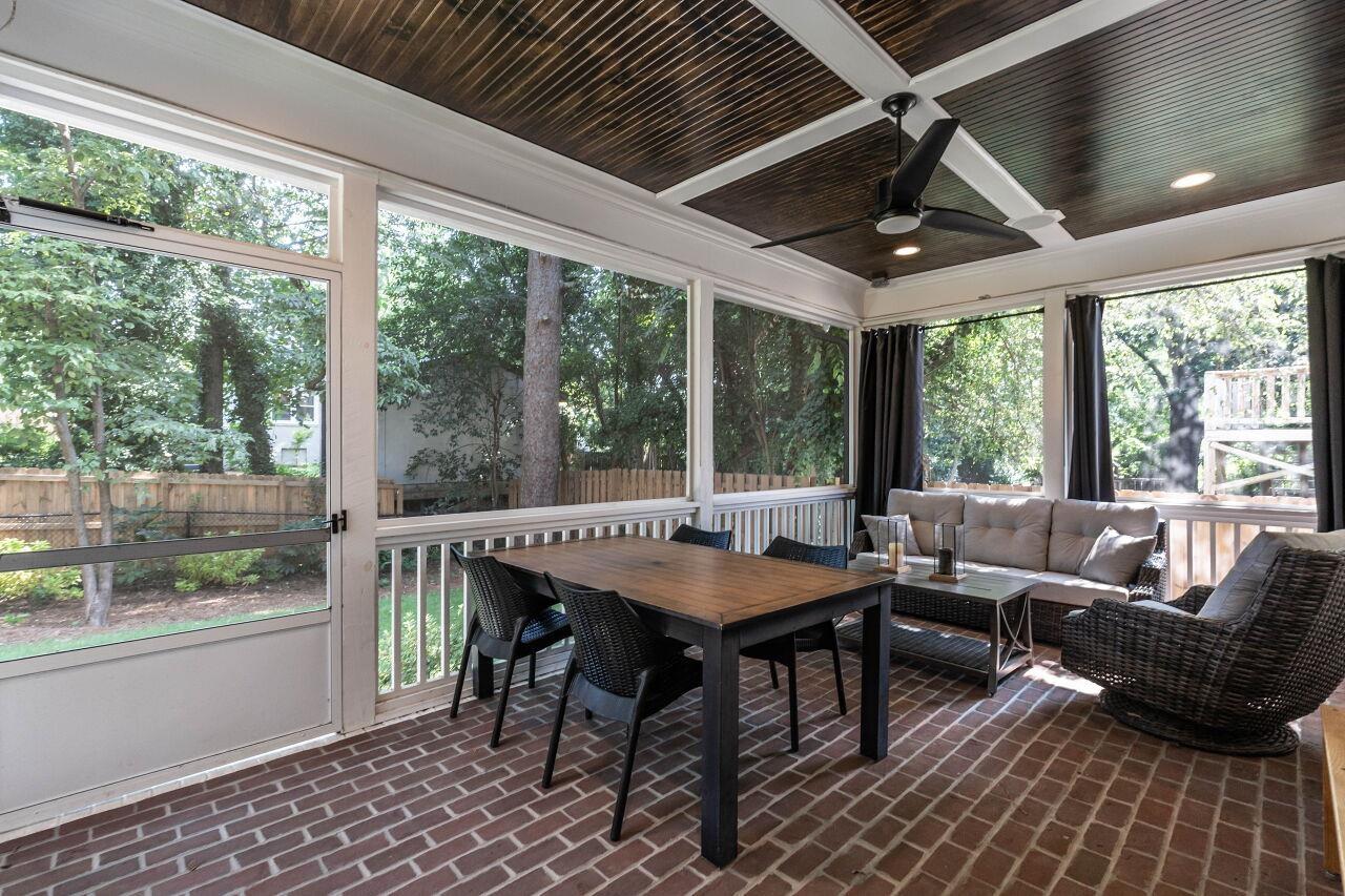 731 New Road Raleigh, NC 27608 - Photo 25 of 28 a outdoor space with furniture and window