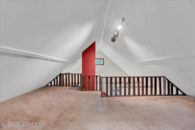 a view of staircase with white walls