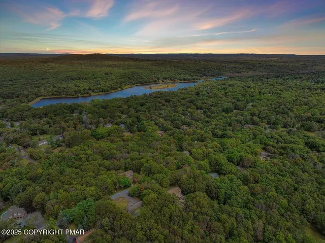 a view of a city with an ocean