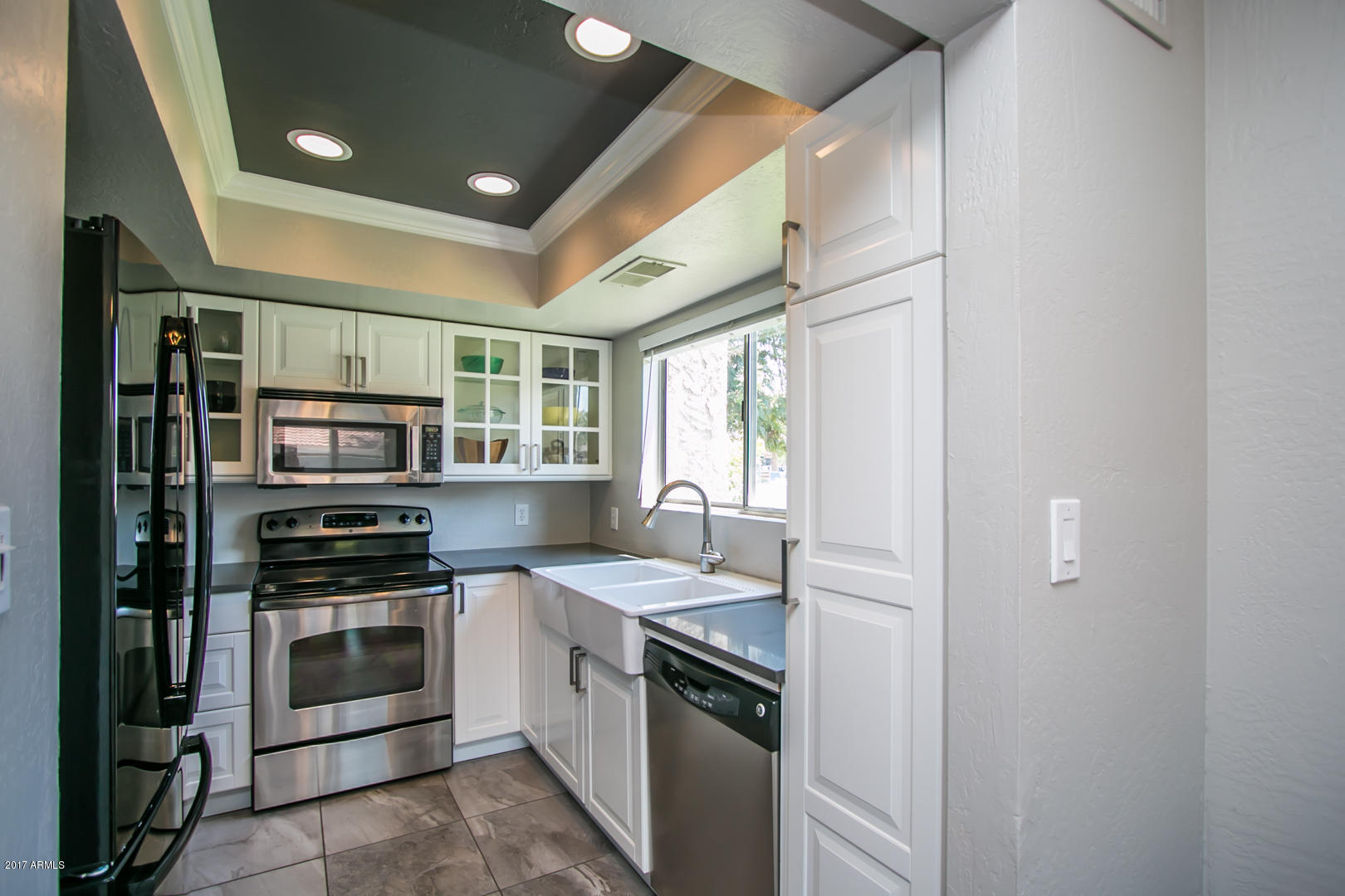 4347 East Osborn Road Phoenix, AZ 85018 - Photo 11 of 22 Quartz Countertops and Stainless Steel