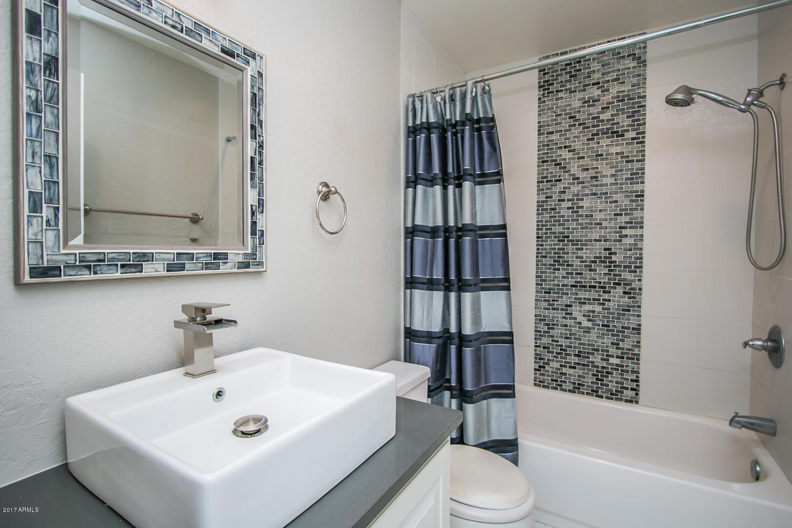 4347 East Osborn Road Phoenix, AZ 85018 - Photo 17 of 22 Remodeled Hall Bathroom