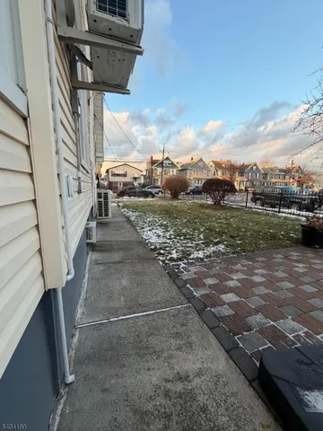 a view of a city street from a corridor