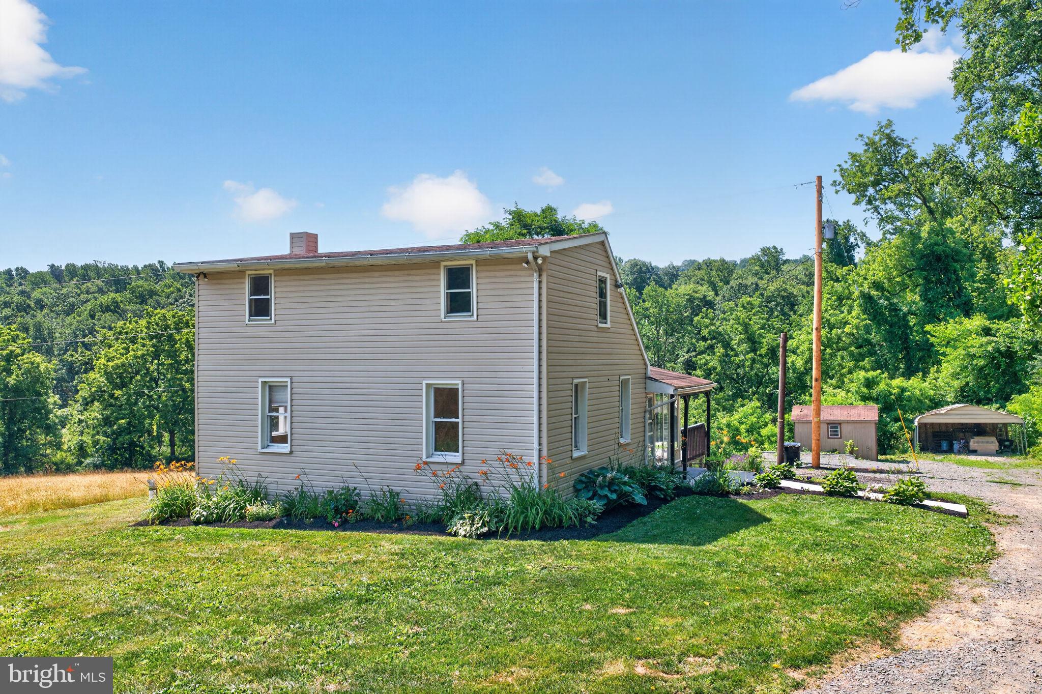 140 Limekiln Road Reading, PA 19606 - Photo 12 of 37 a view of a house with backyard and sitting area