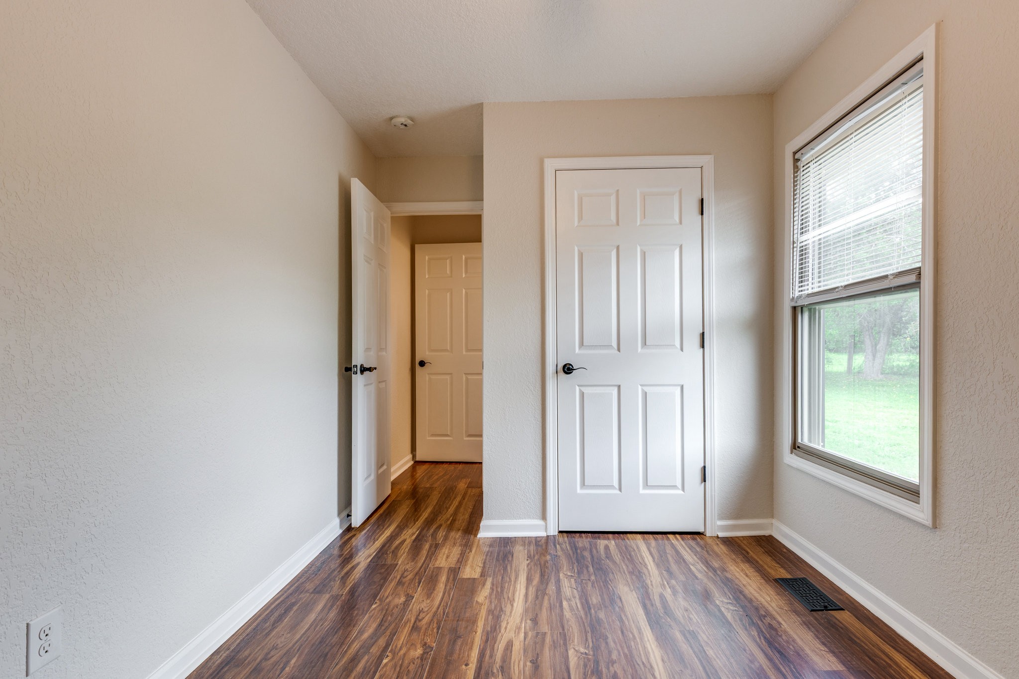 340 Old Spring Creek Road Estill Springs, TN 37330 - Photo 31 of 60 a view of a room with wooden floor and window