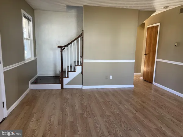 a bathroom with a mirror and a shower