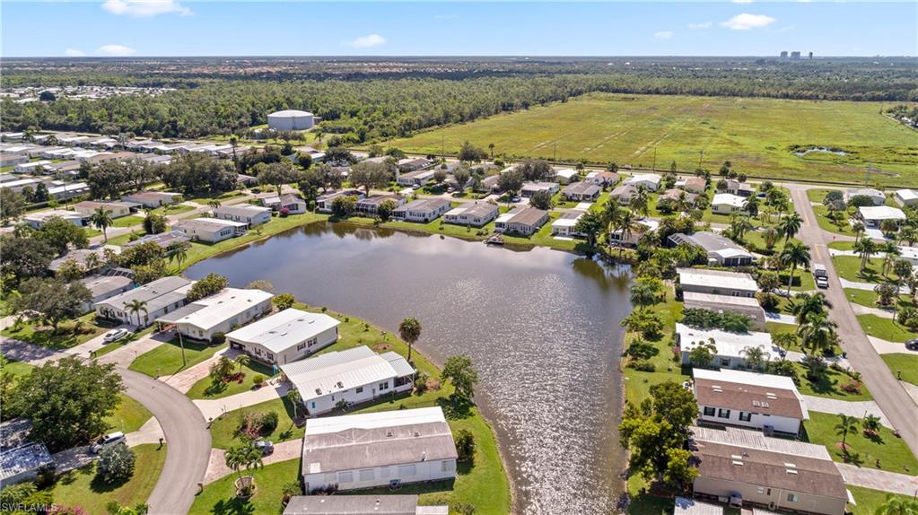 265 Riverwood Road Naples, FL 34114 - Photo 29 of 31 an aerial view of residential houses with outdoor space