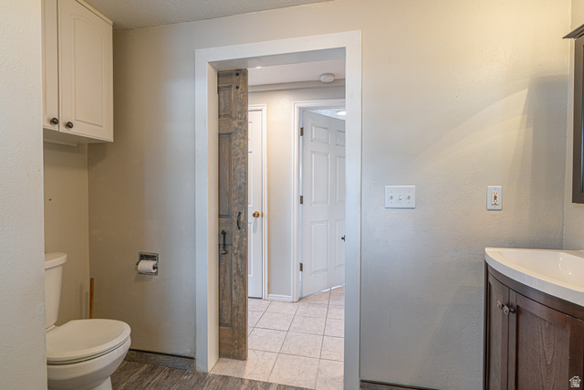 1045 Fox Farm Road Logan, UT 84321 - Photo 31 of 65 Bathroom featuring vanity and toilet