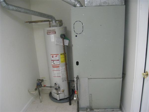 663 Lowell Street, Unit 37 Lexington, MA 02420 - Photo 13 of 13 a bathroom with a sink and a shower