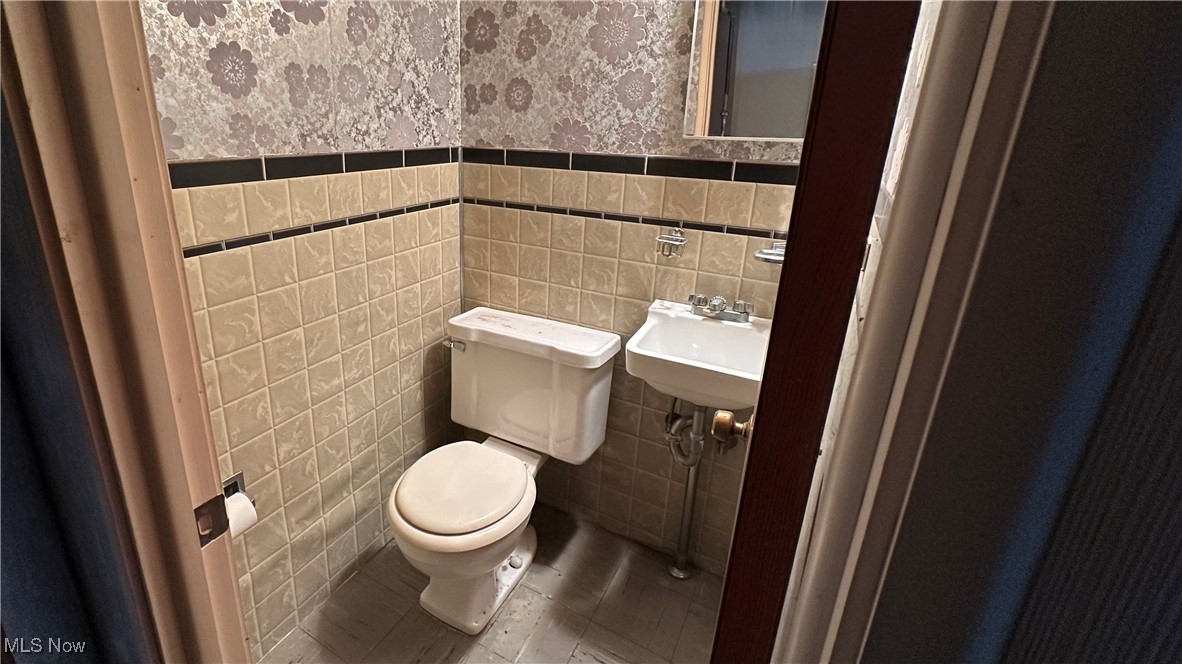 15917 Turney Road Maple Heights, OH 44137 - Photo 16 of 19 Convenient lower level half bath