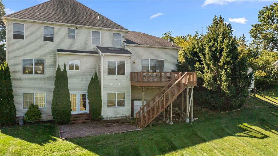 2617 Rising Sun Road Slatington, PA 18080 - Photo 46 of 58 A spacious elevated deck and ground-level patio look out over the grassy backyard.