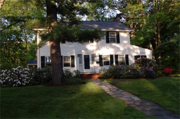 23 Bertwell Road Lexington, MA 02420 - Photo 1 of 1 a front view of a house with a garden