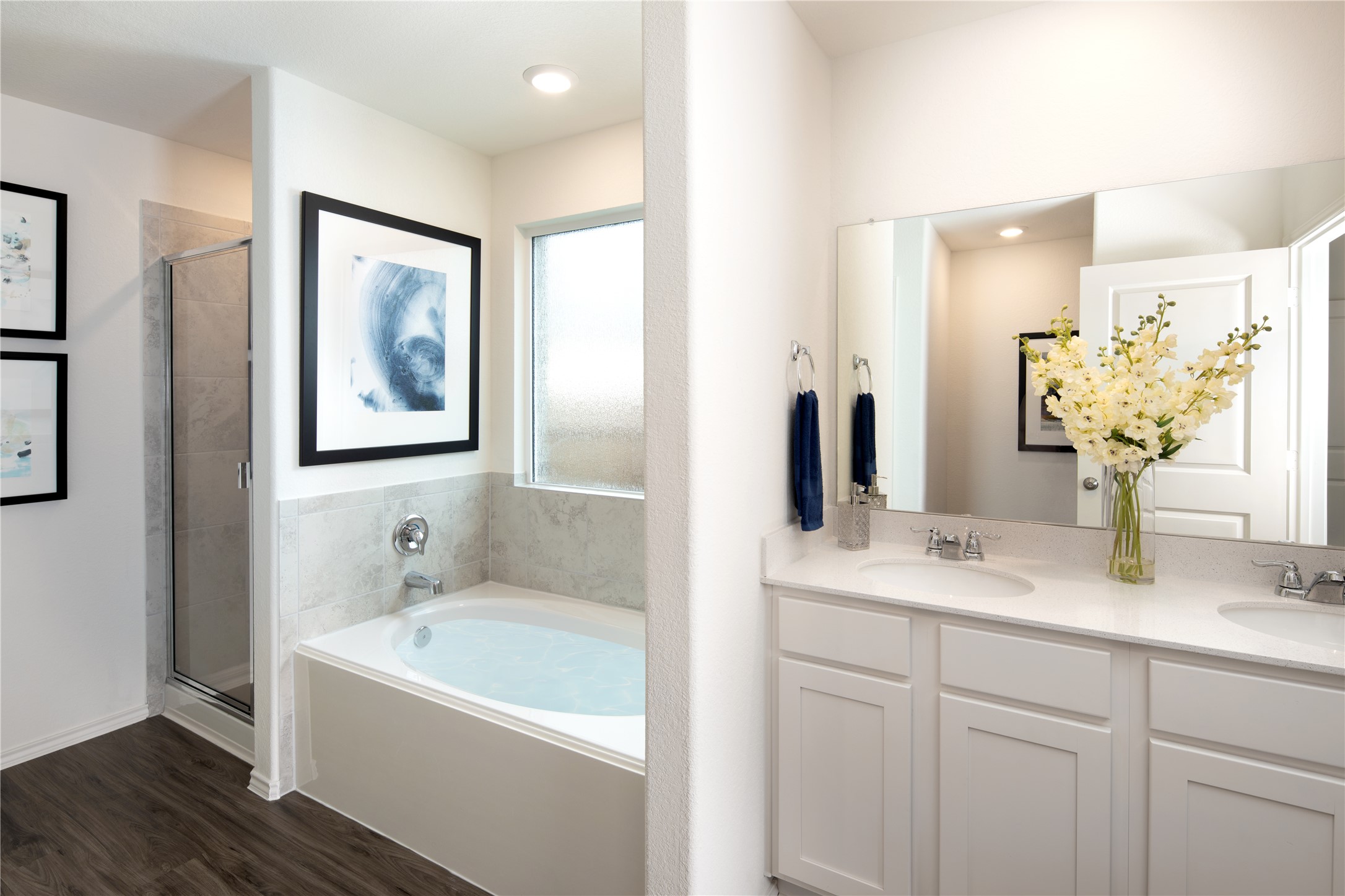 129 Arbordale Street Georgetown, TX 78628 - Photo 12 of 18 a bathroom with a tub sink and mirror