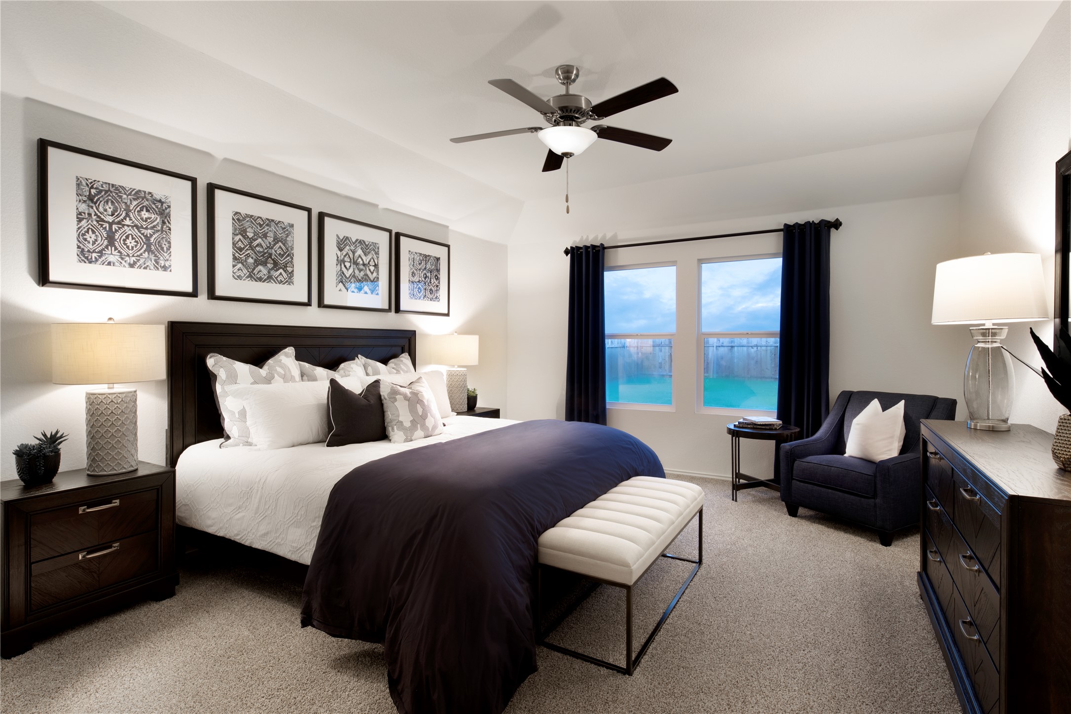 129 Arbordale Street Georgetown, TX 78628 - Photo 5 of 18 a spacious bedroom with a bed a couch and a large window