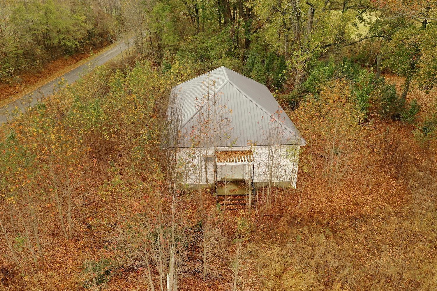 4501 Sidonia Road Sharon, TN 38255 - Photo 5 of 5 a balcony with table and chairs