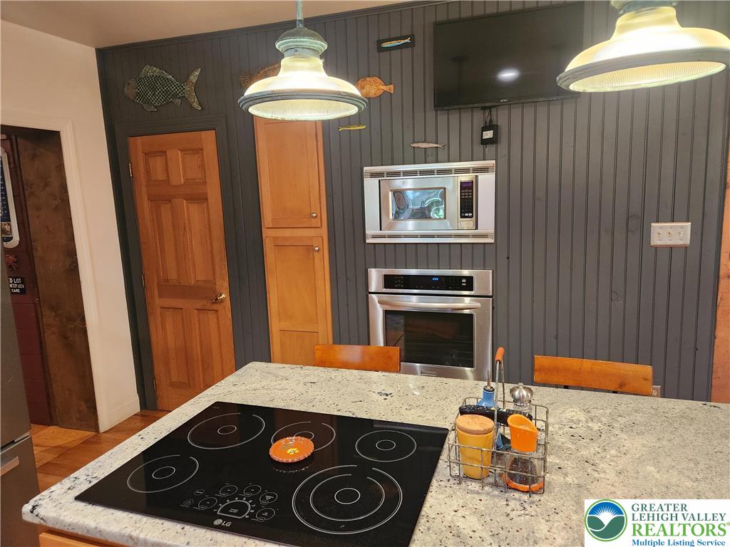 861 Municipal Road Walnutport, PA 18088 - Photo 19 of 94 a kitchen with a stove and a refrigerator