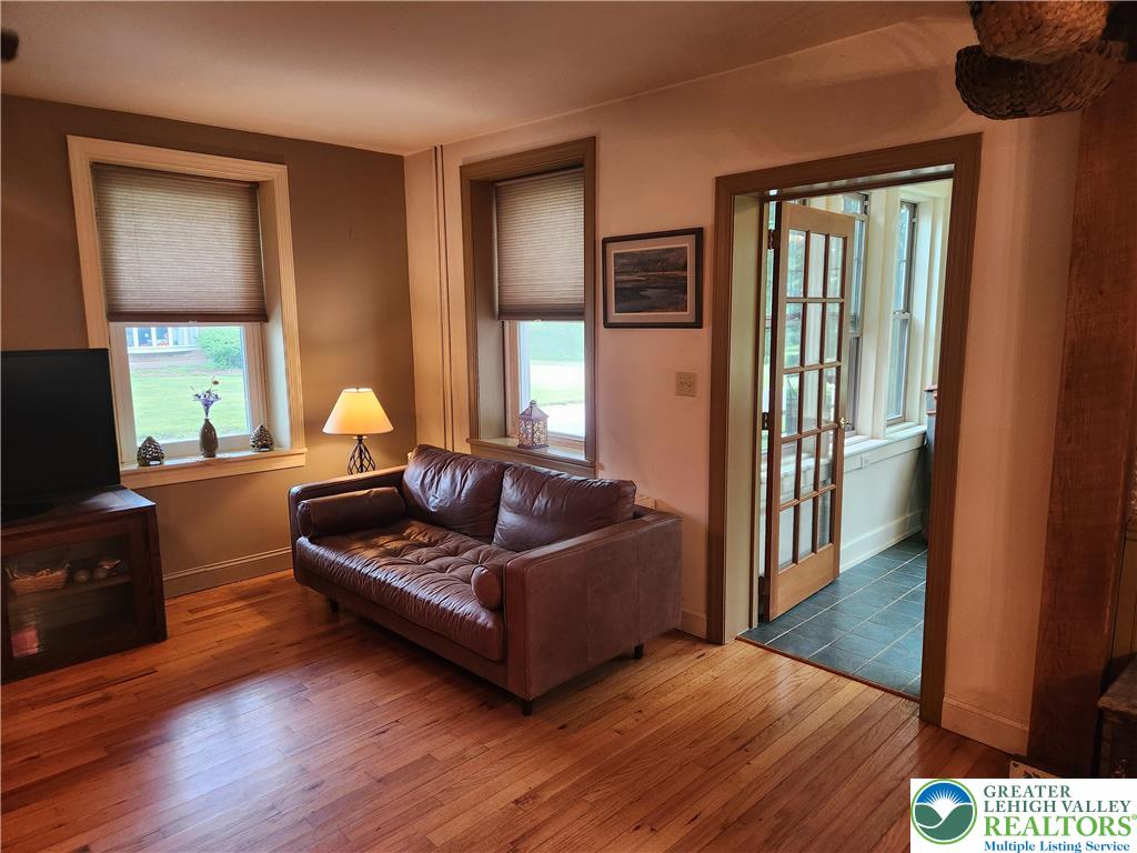 861 Municipal Road Walnutport, PA 18088 - Photo 31 of 94 a living room with furniture and a flat screen tv