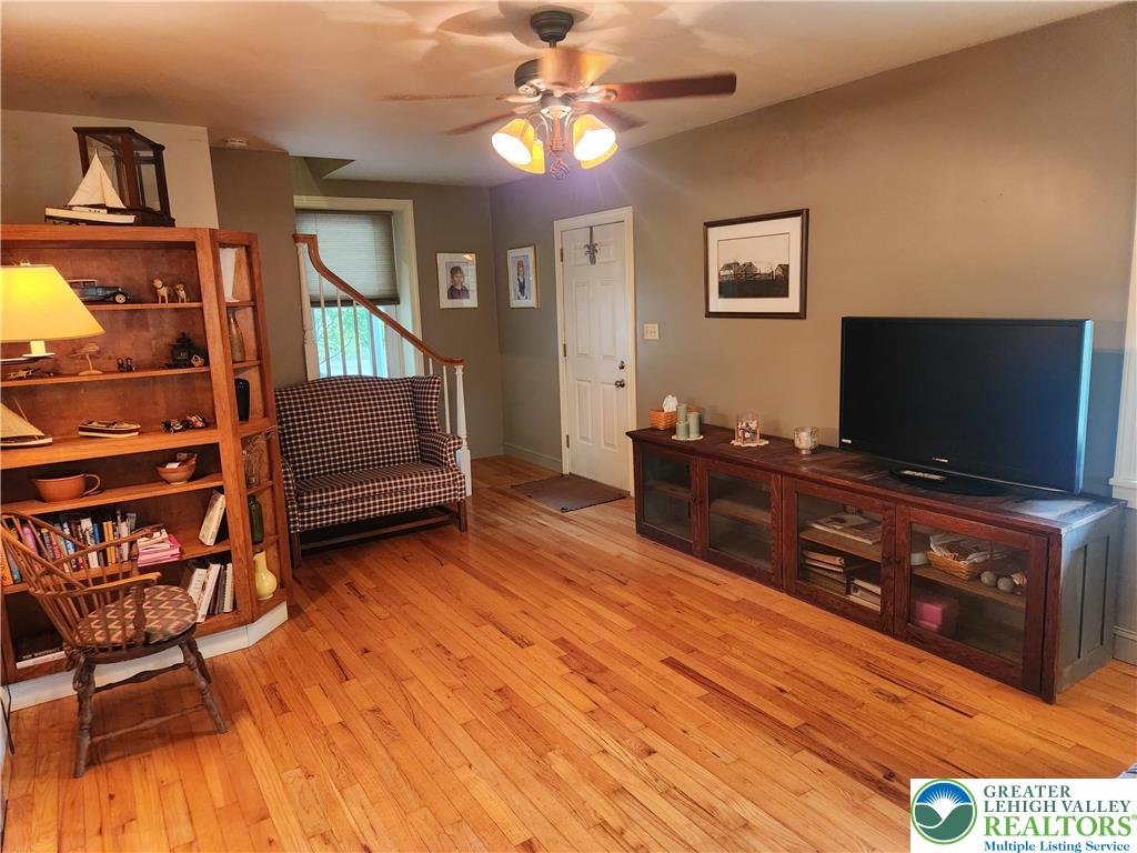 861 Municipal Road Walnutport, PA 18088 - Photo 33 of 94 a living room with furniture and a flat screen tv