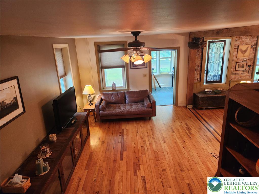 861 Municipal Road Walnutport, PA 18088 - Photo 36 of 94 a living room with furniture and a flat screen tv