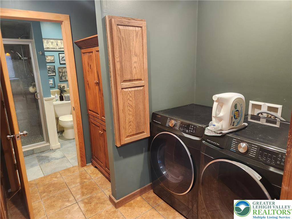 861 Municipal Road Walnutport, PA 18088 - Photo 40 of 94 a utility room with dryer and washer