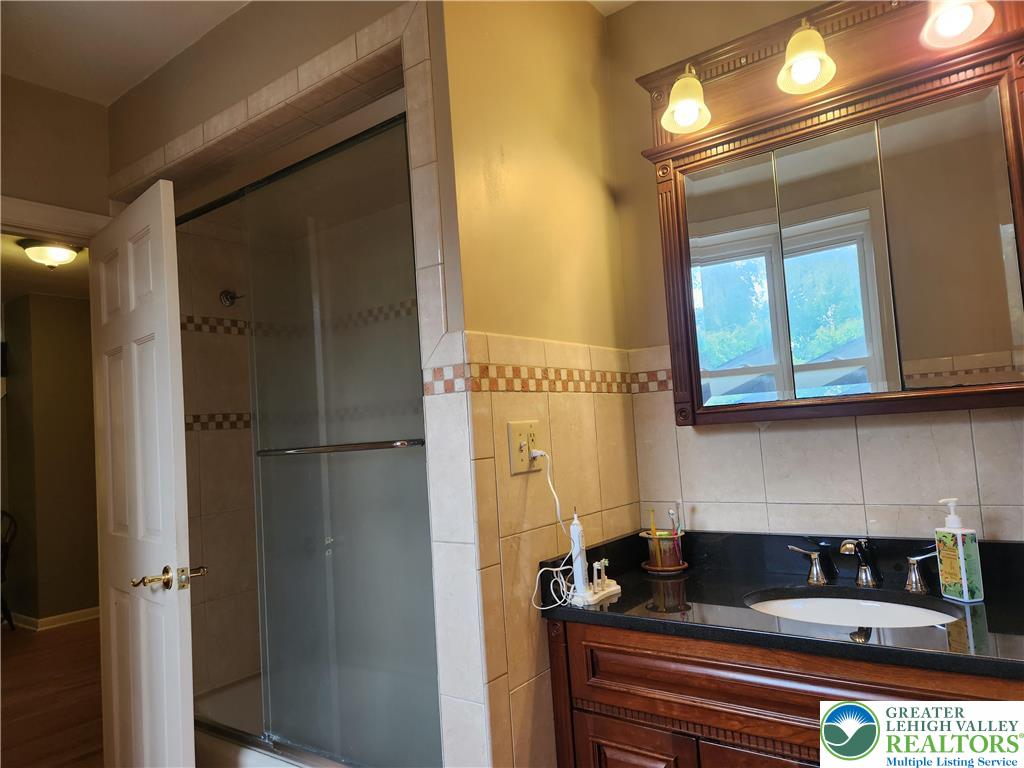 861 Municipal Road Walnutport, PA 18088 - Photo 41 of 94 a kitchen with a refrigerator and a sink