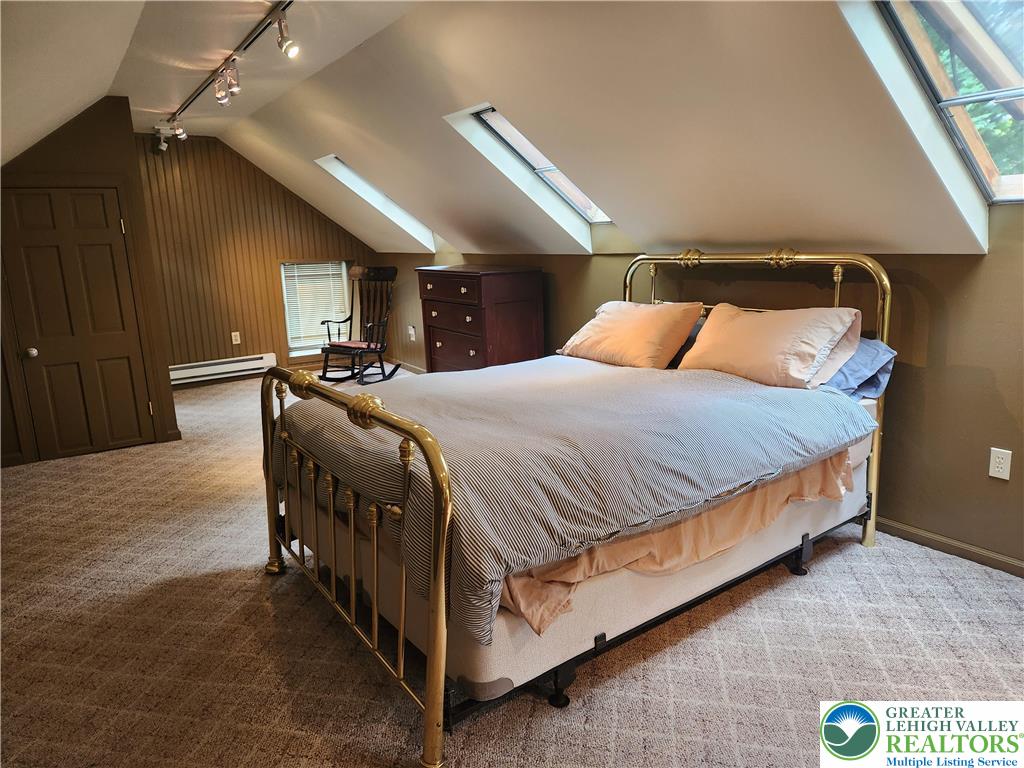 861 Municipal Road Walnutport, PA 18088 - Photo 49 of 94 a bedroom with a bed and a night stand