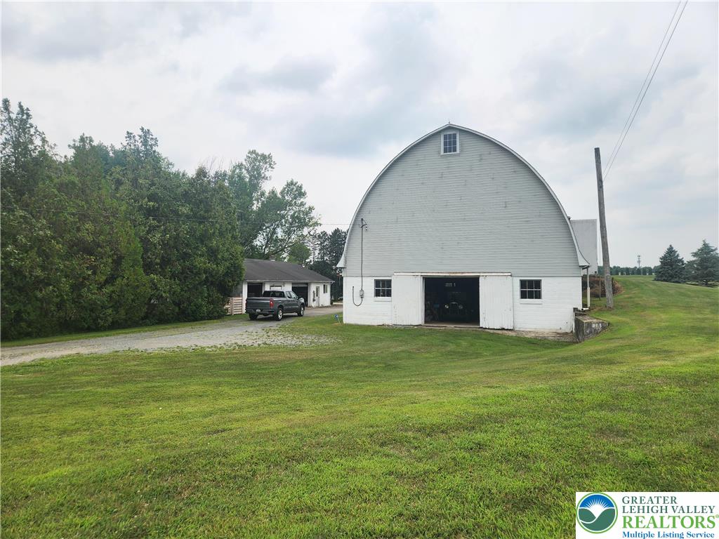 861 Municipal Road Walnutport, PA 18088 - Photo 60 of 94 a house with a yard
