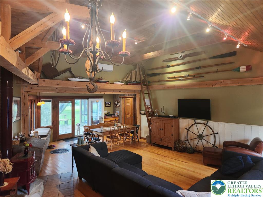 861 Municipal Road Walnutport, PA 18088 - Photo 6 of 94 a living room with furniture and a flat screen tv