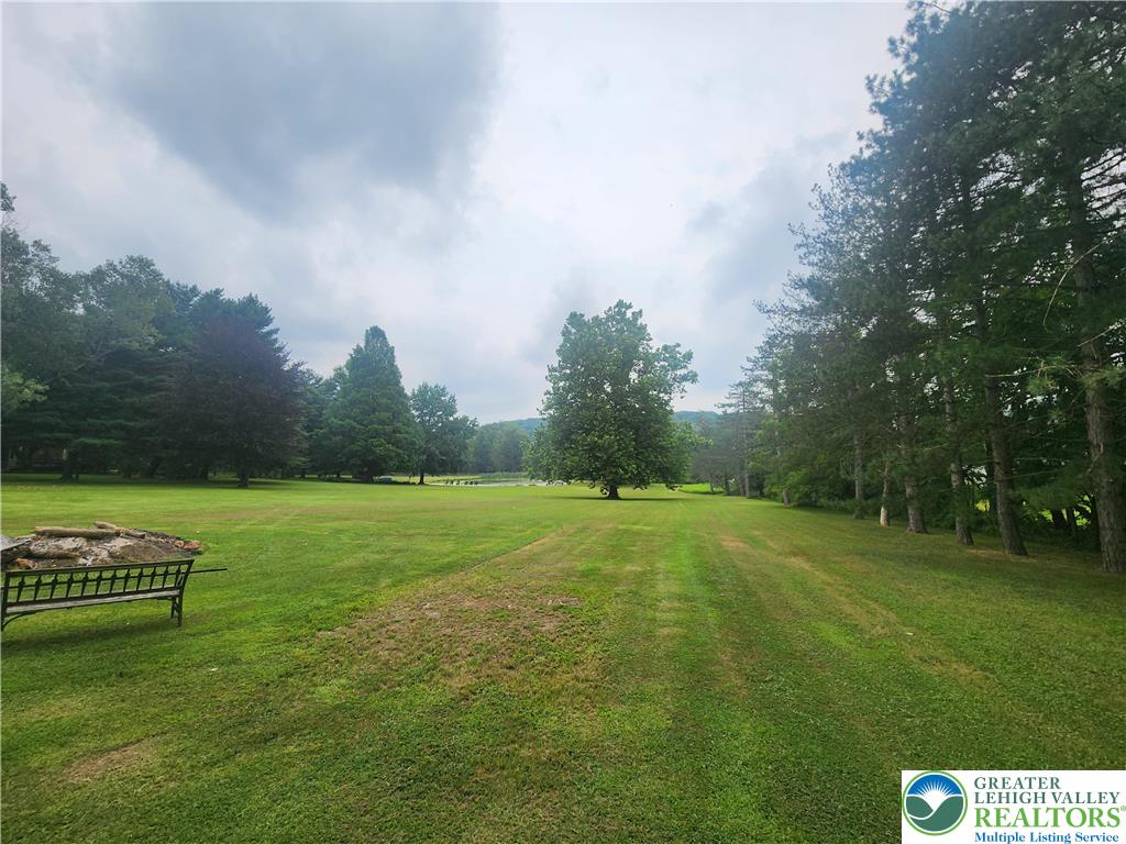 861 Municipal Road Walnutport, PA 18088 - Photo 68 of 94 a view of a golf course with a lake
