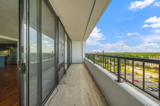 a view of balcony with city view
