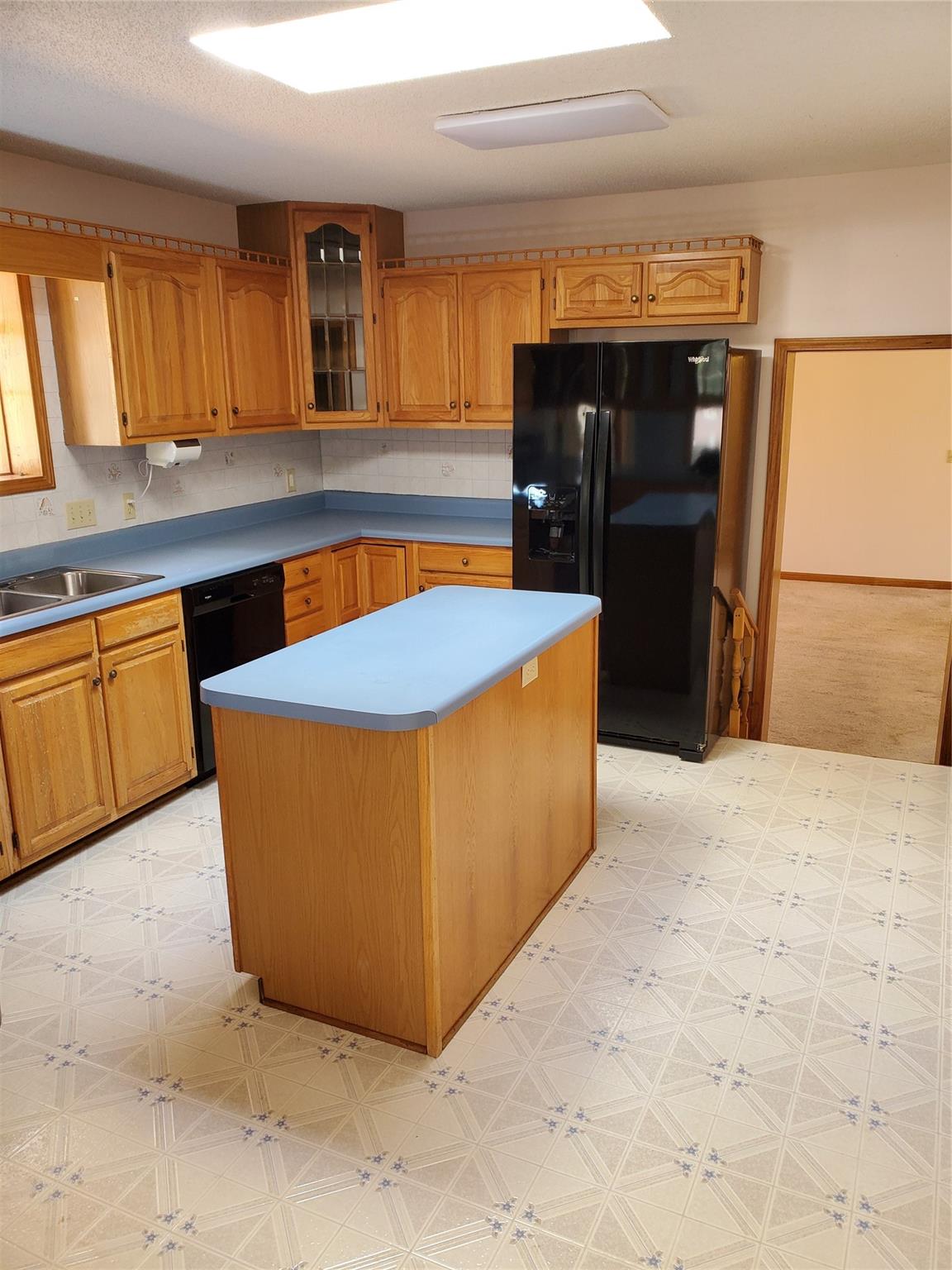 73 Lofty Pine Lane Mills River, NC 28759 - Photo 15 of 29 a kitchen with granite countertop a sink a stove and a refrigerator