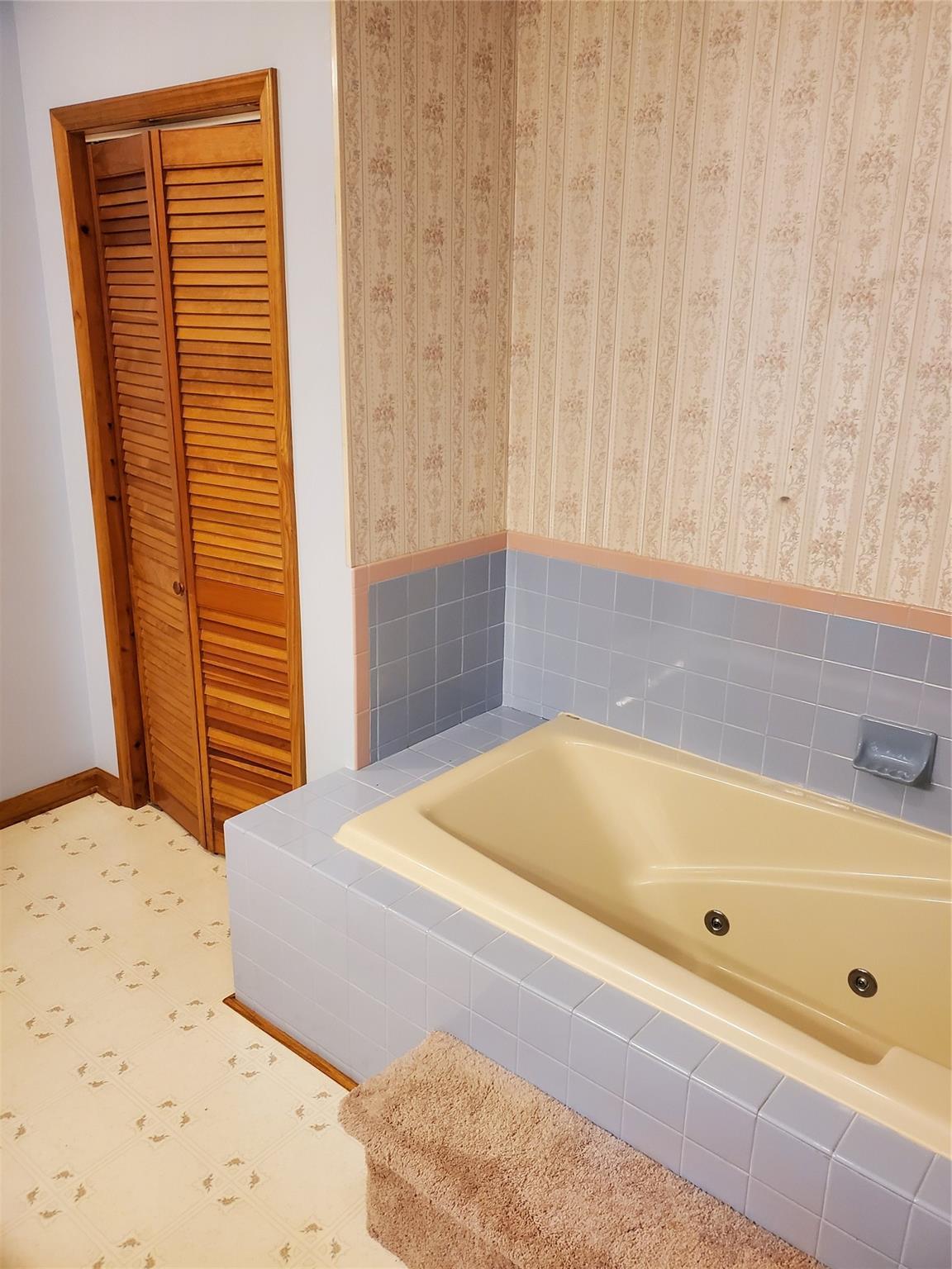 73 Lofty Pine Lane Mills River, NC 28759 - Photo 21 of 29 a bathroom with a tub and shower