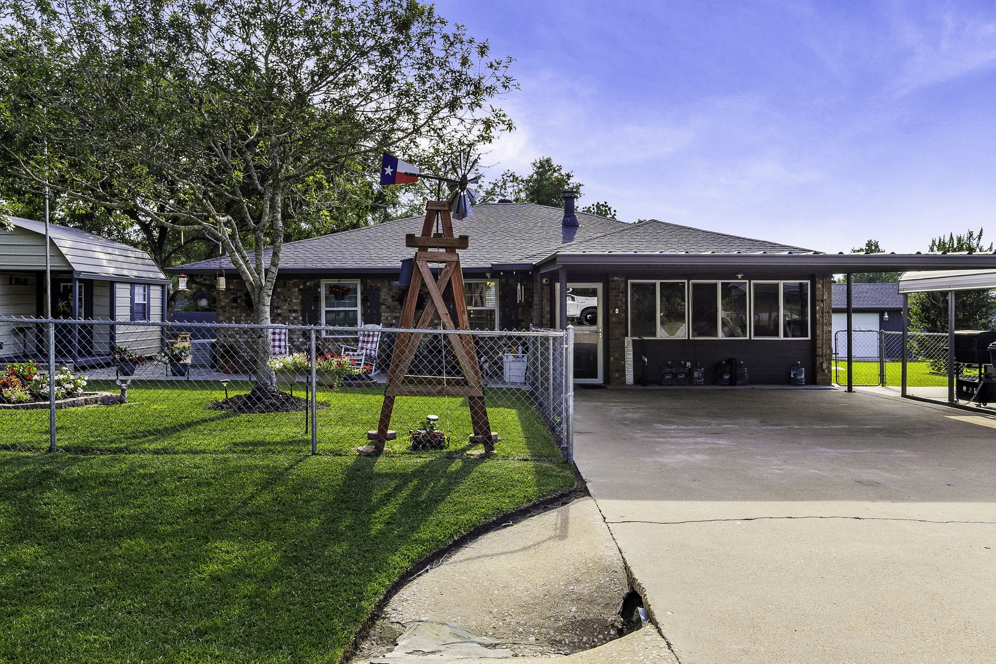 188 Huckleberry Road Onalaska, TX 77360 - Photo 1 of 49 a view of a house with a yard patio and a small yard