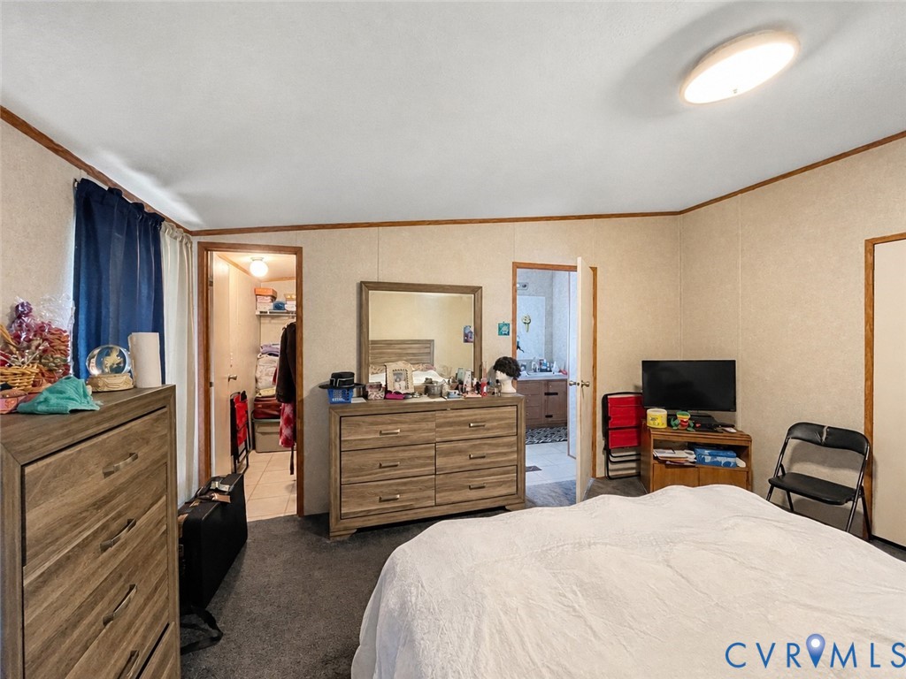 6873 Plank Road Kenbridge, VA 23944 - Photo 20 of 25 Recessed lighting, wood-finish trim, panel walls,