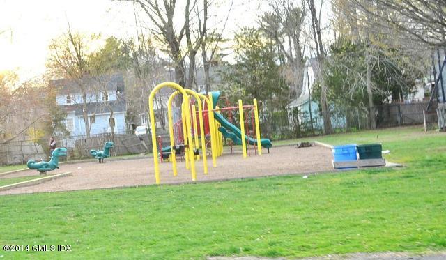 17 Strickland Road Cos Cob, CT 06807 - Photo 17 of 18 a view of a park with swings and slides